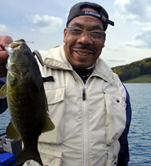 Angler with smallmouth bass