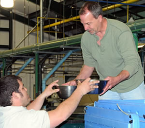 Transferring northern pike fry to Connecticut staff