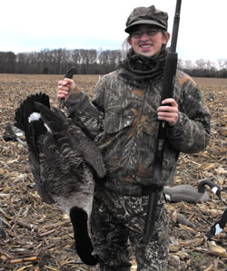 Proud youngster with her first goose