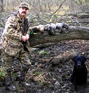 Hunter with puddle duck harvest
