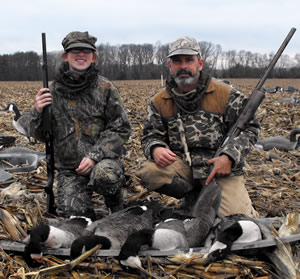 Father and son with Canada goose harvest