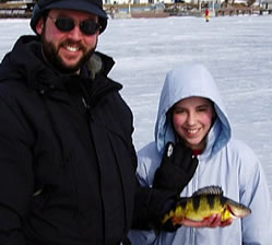 Dad, daughter and yellow perch