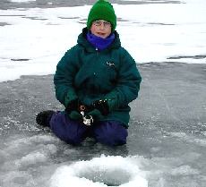 Boy ice fishing