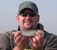 Jim Hartobey with 10-inch laker