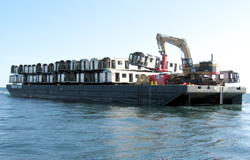 Subway cars on barge