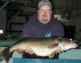 Craig Lemon with trophy walleye