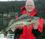 Angler with walleye