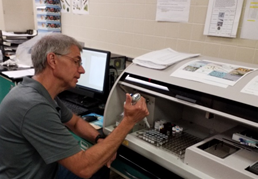 photo: July 23, 2019 HarmfulResearch Scientist at the DEP’s Bureau of Freshwater and Biological Monitoring
performs toxin analysis using a Cyanotoxin Automated Assay System. Source: DEP.
