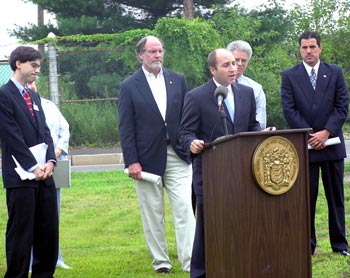 DEP Commissioner Bradley M. Campbell, Senator Jon S. Corzine, Assemblyman Jack Conners ( District 7), Florence Township Mayor Michael J. Muchowski and Doug O' Malley of New Jersey Public Interest Research Group visit the Roebling Superfund site in Florence Township to discuss Superfund cleanup funding.