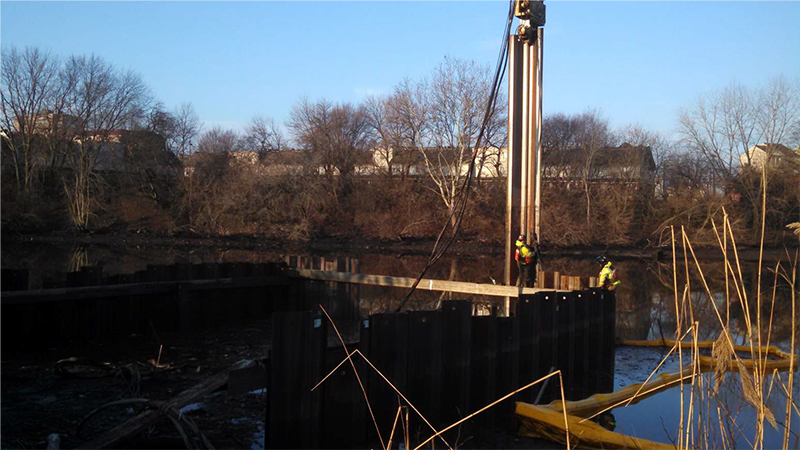 photo-Excavation of tranch Coffer dam installation at mouth of kayak channel in Cooper River