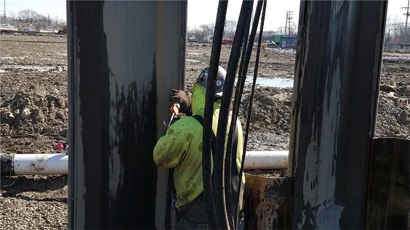 Sealant application to seams in the fishing pond weir