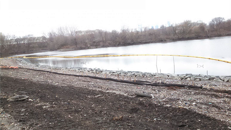 photo-Shoreline stabilization showing turbidity barrier and silt sock erosion controls