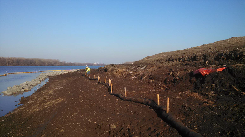 photo-Shoreline stabilization showing turbidity barrier and silt sock erosion controls