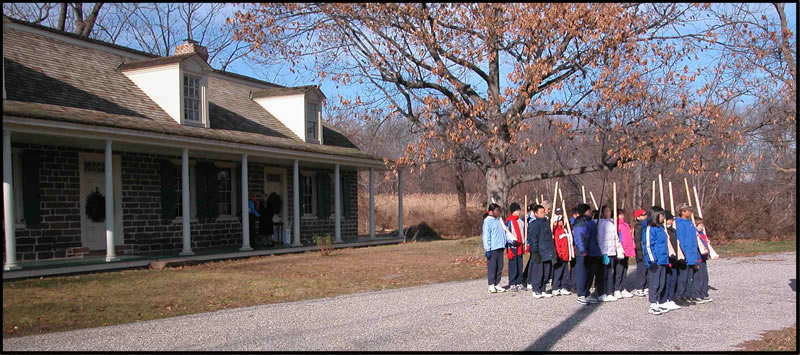 Kids Marching in front of Steuben House