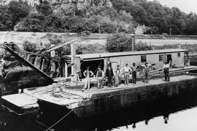 Dredge crew on the feeder canal, c. 1900