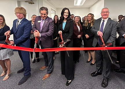 Acting Commissioner Susan Ochs, joined by Hanover Township Mayor Thomas “Ace” Gallagher and Morris County Commissioner Director Stephen Shaw, left, and George Wall, the Bureau’s Chief of Investigations, cut the ribbon.