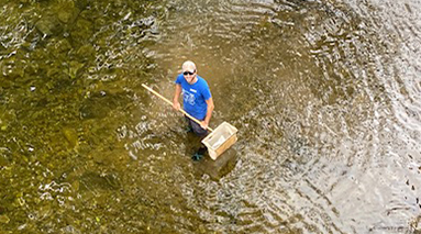 A man standing in the river