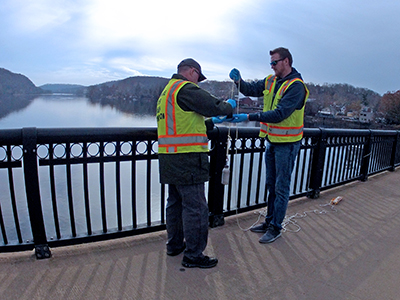 DRBC staff collects a sample to monitor for 1,4-Dioxane. Photo by DRBC.