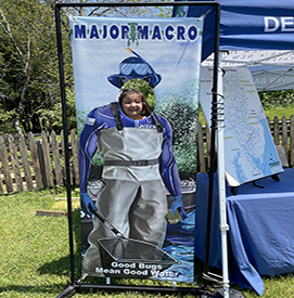 Folks got to get their photo taken as Aquatic Biologist Superhero Major Macros. Photo by the DRBC.