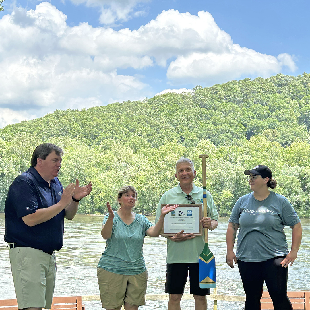 Lower Mount Bethel Township Supervisor and longtime Sojourn Steering Committee member John Mauser (center, with paddle), received the High Admiral Award. Photo by the DRBC.