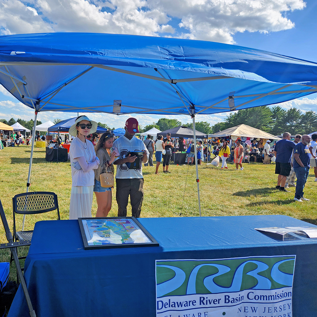 Juneteenth attendees fill out DRBC's climate survey. Photo by the DRBC.