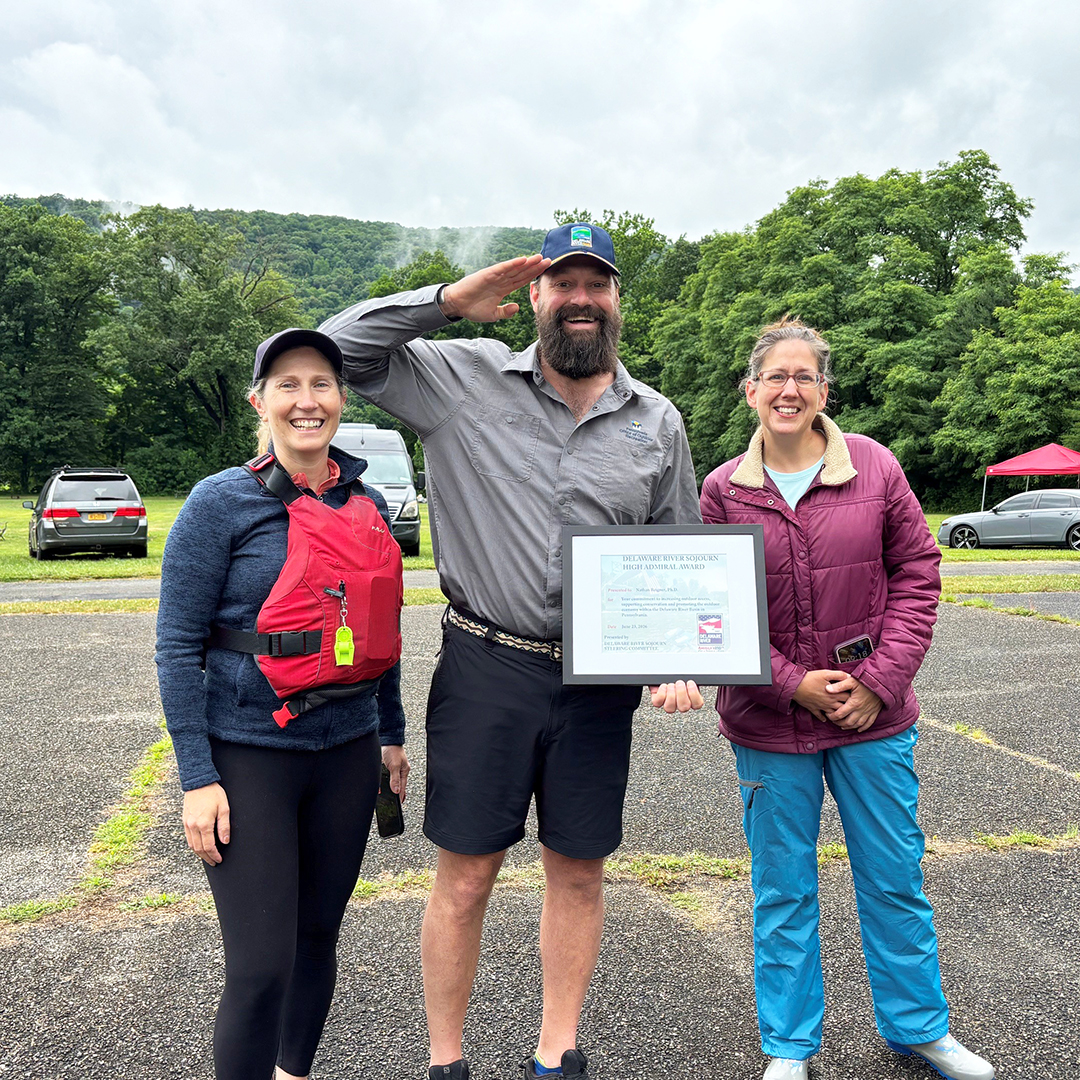 Elizabeth Brown (L), PA Director of Outdoor Recreation Dr. Nathan Reigner (center) and DRBC's Kate Schmidt (R) pose for a photo after honoring Dr. Reigner with the High Admiral Award. Photo courtesy of Thomas Gilbert, Pennsylvania Environmental Council.