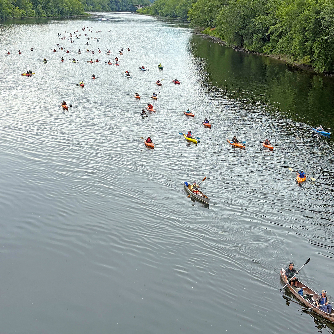 Sojourners paddle under the Portland Bridge on Day 4. Photo courtesy of Allison Heinsohn.