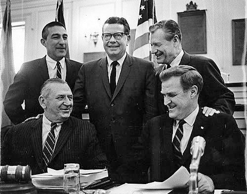 At its March 1968 annual meeting in New York City, the DRBC adopted broad regulations with procedures for implementing and enforcing water pollution control standards enacted a year earlier for the basin.  Pictured here standing at the meeting are (from left to right) U.S. Secretary of the Interior Stewart L. Udall (President Lyndon Johnson’s appointed federal DRBC member), New Jersey Governor Richard J. Hughes, and New York Governor Nelson A. Rockefeller. Seated are (from left to right) Delaware Governor Charles L. Terry, Jr. and Pennsylvania Governor Raymond P. Shafer. Secretary Udall declared that only the Delaware among the nation’s river basins was moving into “high gear” in its pollution abatement efforts.  
