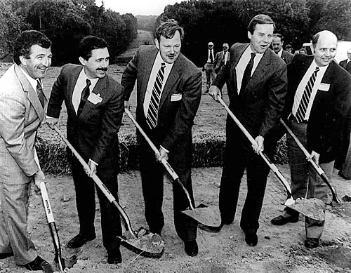 New Jersey Governor Thomas H. Kean (second from right) heads up the Merrill Creek Reservoir ground-breaking ceremonies on September 23, 1985. Also digging in are (left to right) Robert J. Touhey, DRBC Commissioner from Delaware representing Governor Michael N. Castle; R. Timothy Weston, DRBC Commissioner from Pennsylvania representing Governor Dick Thornburgh; DRBC Executive Director Gerald M. Hansler; and Dirk C. Hofman, DRBC Commissioner from New Jersey. Water storage in this reservoir, located near Phillipsburg, N.J. and owned by a consortium of utility companies, is used to replace evaporative water losses (“consumptive use”) caused by power generation when the basin is under DRBC-declared drought operations. 