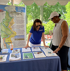 The DRBC's Stacey Mulholland talks with an event participant. Photo by the DRBC.