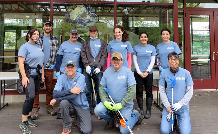 DRBC staff pose for a photo in front of Palmyra Cove's STEM educational center. Photo by DRBC.