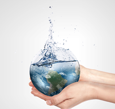 Abstract image of the earth and water being held in hands.
