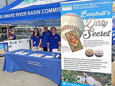 (From L to R) DRBC's Meg Ruggles, Tom Amidon, and Alex Servis are ready to mud ball at a recent Iron Pigs home game. Photo by DRBC.