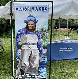 Attendees had the opportunity to gettheir photo taken as Major Macro, ourBiology Superhero. Photo by the DRBC.