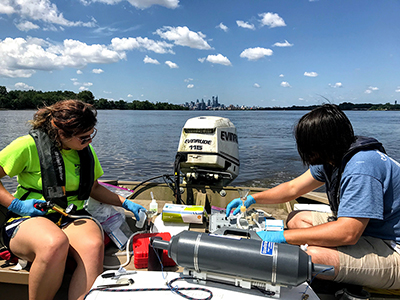 DRBC staff collect water samples to study light extinction. Photo by DRBC.
