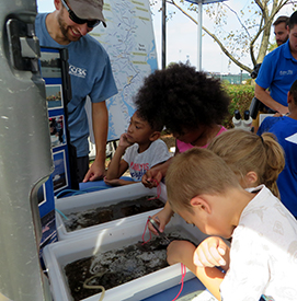 We love nothing more than seeing engaged kids eager to learn about what we do! Photo by DRBC.