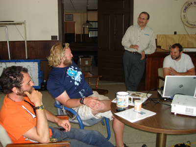 DRBC Communications Manager Clarke Rupert (standing) talks with educators from the Bayshore Center at Bivalve about the Delaware River Basin.