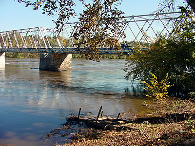 View of the Delaware River from Washington Crossing Historical Park, Pa. (12:14 p.m. on Oct. 30, 2003). The steps that normally can be seen descending several feet to the river's edge are nearly submerged, with only the top of stairs still visible (see bottom of photo)