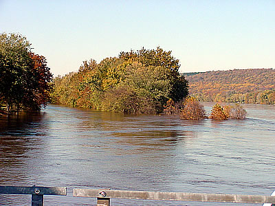 View of the Delaware River from the Washington Crossing Bridge (12:27 p.m. on Oct. 30, 2003). The trees at the tip of the island are nearly submerged.