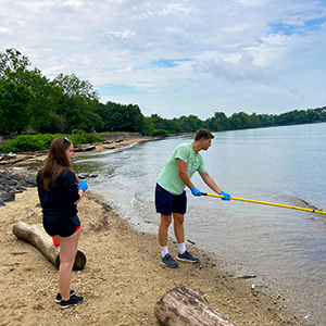 DRBC staff collects a water sample to monitor for bacteria. Photo by the DRBC.