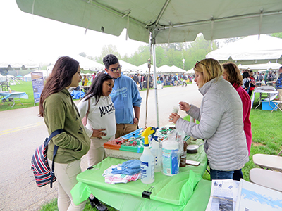 DRBC's Donna Woolf shows students what happens to pollutants on the land when it rains. Photo by DRBC.