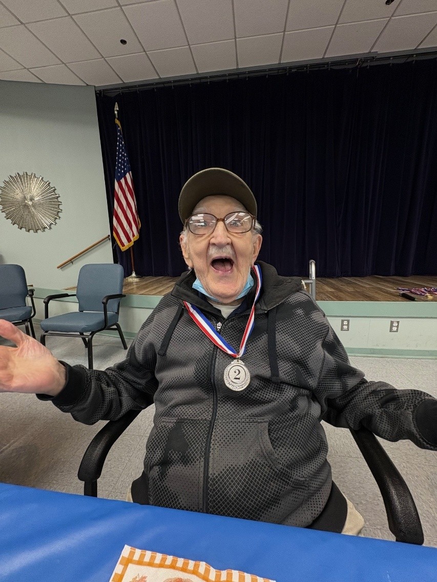 Veteran showing off a medal