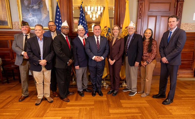 Group photo of Solomeno’s family, DVA senior leadership, and the state commanders of the American Legion, Disabled American Veterans, Jewish War Veterans, and the Veterans of Foreign Wars 