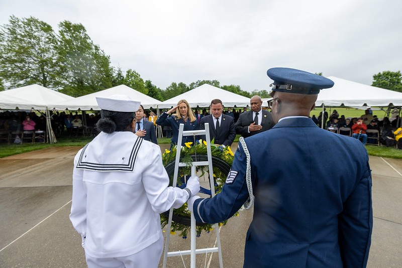 Senator Andy Kim, Governor Mikie Sherrill, Commissioner Vincent Solomeno, and Congressman Herb Conaway (pictured left to right) present the state wreath in the annual Memorial Day Ceremony.
