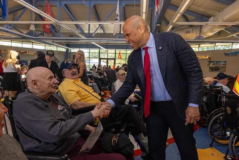 Senator Booker with a State Medal recipient at the Paramus Veterans Home.