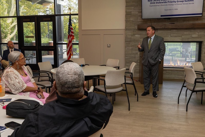 Commissioner Solomeno speaking with leaders at the NJ Governor's challenge Fall Summit at Cherry Blossom Welcome Center.