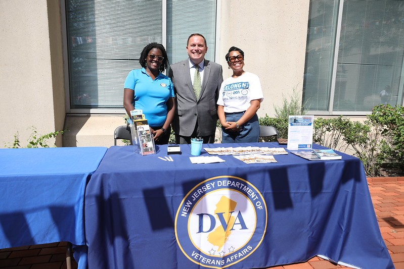 Commissioner Vincent Solomeno with staff at the DVA booth at Belonging Day.