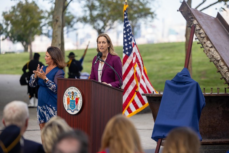 Governor Mikie Sherrill speaking at the State Commemoration of September 11, 2001, at the Empty Sky Memorial at the Liberty State Park in Jersey City.