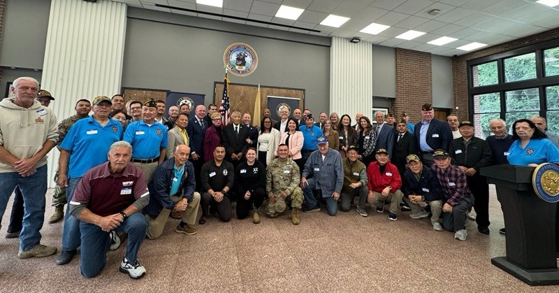 Deputy Commissioner Esther Chucharalao, Congressman Josh Gottheimer, and others celebrate the 100th birthday of Sgt. August 