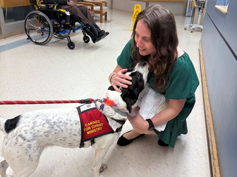 Tilly, a therapy dog from Canines for Christ Ministry, visiting residents and staff at the Paramus Veterans Home.